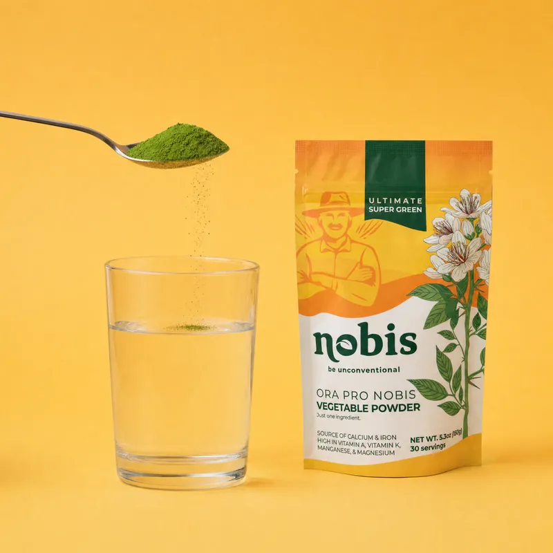 A spoon of ora pro nobis powder over a glass of water